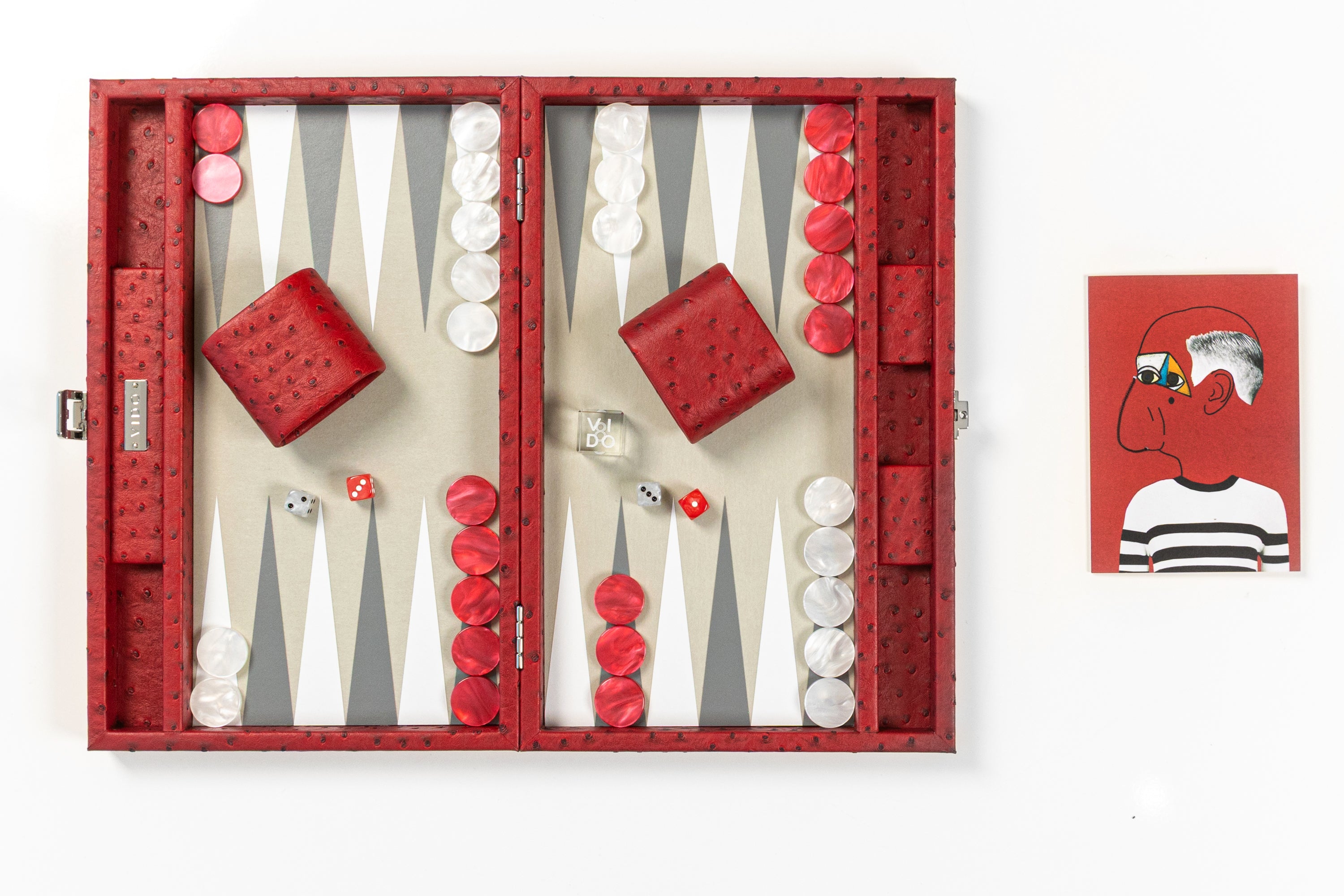 A red backgammon board game set with ostrich skin vegan and red and white checkers and dice by VIDO
